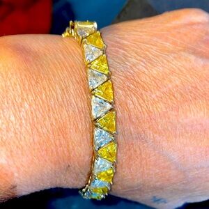 UTC Trillion cut clear/yellow crystals goldtone 925 sterling bracelet 8 1/2”